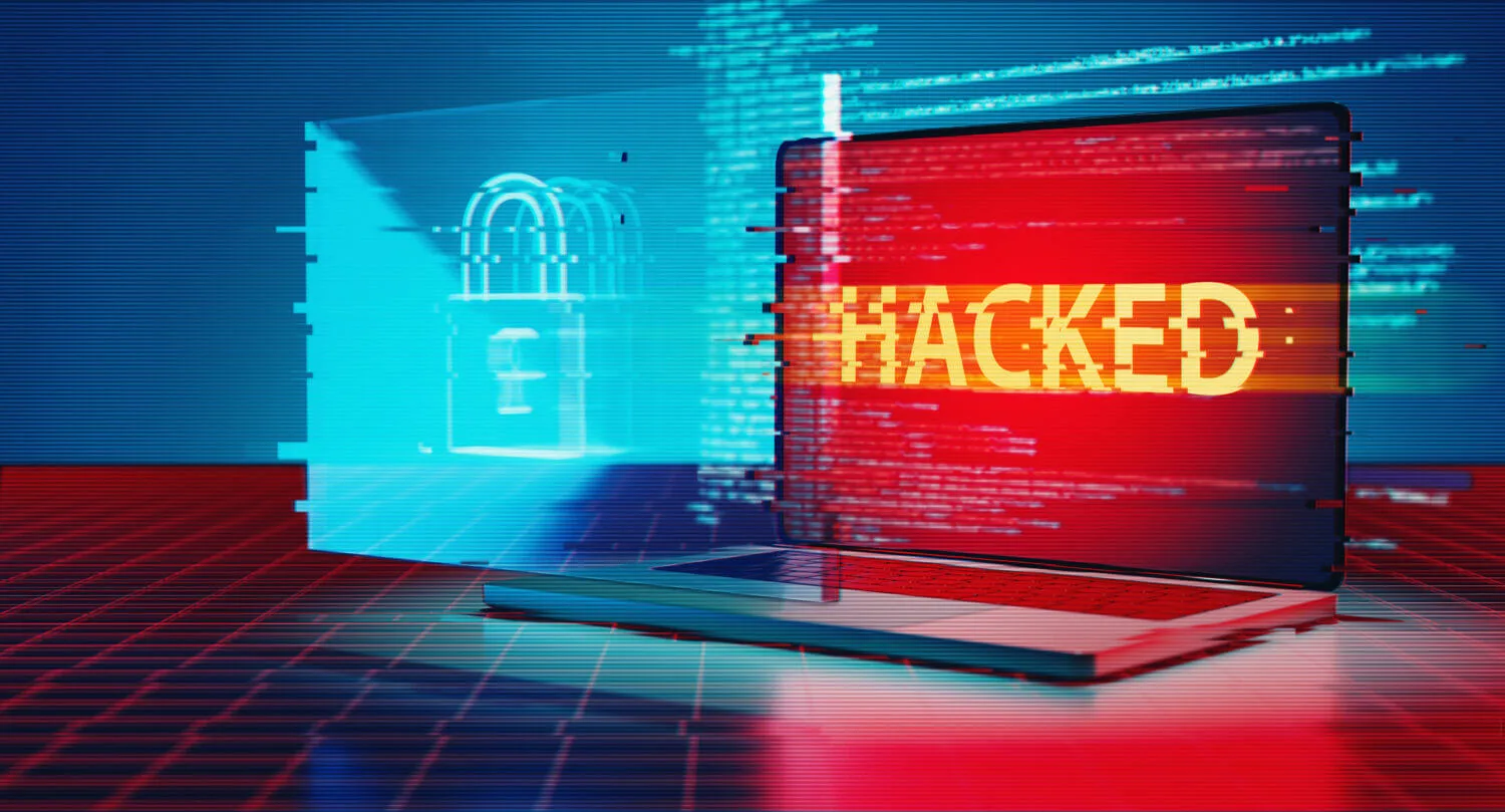 hacked in text on a computer